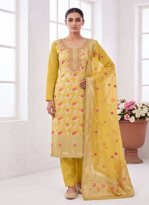 Grab These Suit in Fine Colored Pair With Bottom And Dupatta.These Top Are Banarasi Cotton And Dupatta Are Fabricated On Banarasi Jacquard Pair With Dull Santoon Bottom.Its Beautified With Woven Designer, Hand Work.