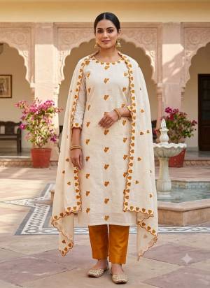 Garb This Suits In Lovely Color.Its Pretty Top Is Cora Cambric Cotton Based Paired Bottom Cotton And Cora Cambric Cotton Fabricated Dupatta Are Designer Embroidery Work. Which Gives An Attractive To The Dress.