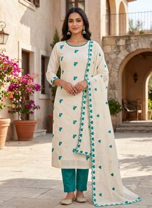 Garb This Suits In Lovely Color.Its Pretty Top Is Cora Cambric Cotton Based Paired Bottom Cotton And Cora Cambric Cotton Fabricated Dupatta Are Designer Embroidery Work. Which Gives An Attractive To The Dress.