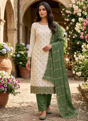 Looking This Suits In Lovely Color.Its Pretty Top Is Vichitra Silk Based Paired Bottom Santoon And Vichitra Silk Fabricated Dupatta Are Designer Embroidery Work. Which Gives An Attractive To The Dress.