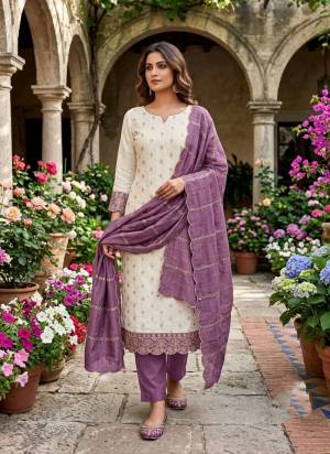 Looking This Suits In Lovely Color.Its Pretty Top Is Vichitra Silk Based Paired Bottom Santoon And Vichitra Silk Fabricated Dupatta Are Designer Embroidery Work. Which Gives An Attractive To The Dress.