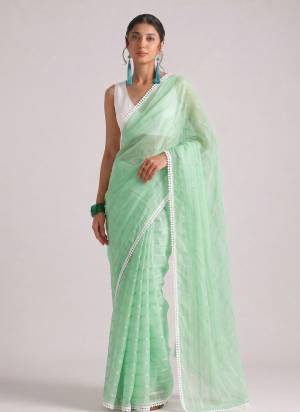 Looking These Party Wear Ready To Wear Saree in Fine Colored.These Saree Are Chiffon And Blouse is Art Silk Fabricated.Its Beautified With Woven Lining Designer With Lace Border.