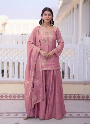 Garb These Suit in Fine Colored Pair With Bottom And Dupatta.These Top Are Fendy And Bottom Are Fabricated On Fendy Pair With Fendy Dupatta.Its Beautified With Designer Embroidery Work.
