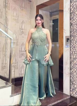 Garb These Suit in Fine Colored Pair With Bottom .These Top Are Fendy And Bottom Are Fabricated On Fendy Pair.Its Beautified With Designer Embroidery Work.
