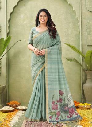 Looking These Festive Wear Saree in Fine Colored.These Saree And Blouse is Fabricated On Ghicha Cotton.Its Beautified With Woven Swan,Lotus Resham Pallu Designer.