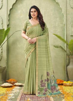 Looking These Festive Wear Saree in Fine Colored.These Saree And Blouse is Fabricated On Ghicha Cotton.Its Beautified With Woven Swan,Lotus Resham Pallu Designer.