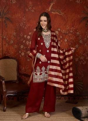 Garb These Suit in Fine Colored Pair With Bottom And Dupatta.These Top Are Vichitra And Bottom Are Fabricated On Vichitra Pair With Jacquard Silk Dupatta.Its Beautified With Designer Embroidery Work.