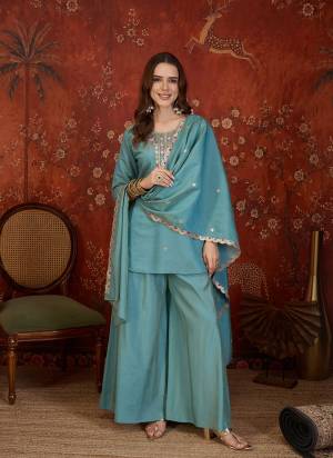 Garb These Suit in Fine Colored Pair With Bottom And Dupatta.These Top Are Roman Simmer And Bottom Are Fabricated On Roman Simmer Pair With Roman Simmer Dupatta.Its Beautified With Designer Embroidery Work.