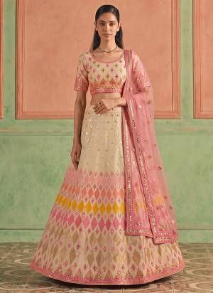 For A Designer Look,Grab These Lehenga Choli in Fine Colored.These Lehenga And Blouse Are Fabricated On Organza Pair With Soft Net Dupatta.Its Beautified With Designer Embroidery,Foil Mirror Work.