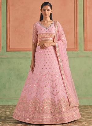 For A Designer Look,Grab These Lehenga Choli in Fine Colored.These Lehenga And Blouse Are Fabricated On Organza Pair With Soft Net Dupatta.Its Beautified With Designer Embroidery,Foil Mirror Work.
