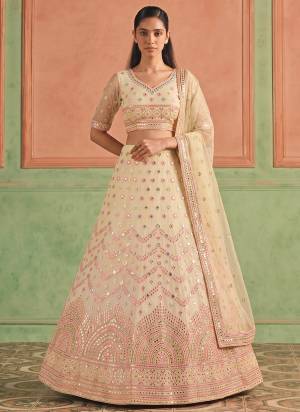 For A Designer Look,Grab These Lehenga Choli in Fine Colored.These Lehenga And Blouse Are Fabricated On Organza Pair With Soft Net Dupatta.Its Beautified With Designer Embroidery,Foil Mirror Work.