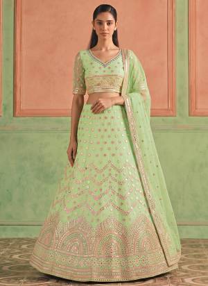 For A Designer Look,Grab These Lehenga Choli in Fine Colored.These Lehenga And Blouse Are Fabricated On Organza Pair With Soft Net Dupatta.Its Beautified With Designer Embroidery,Foil Mirror Work.