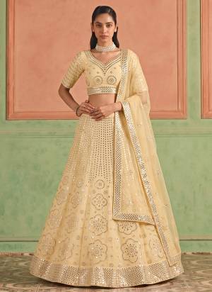 For A Designer Look,Grab These Lehenga Choli in Fine Colored.These Lehenga And Blouse Are Fabricated On Organza Pair With Soft Net Dupatta.Its Beautified With Designer Embroidery,Foil Mirror Work.