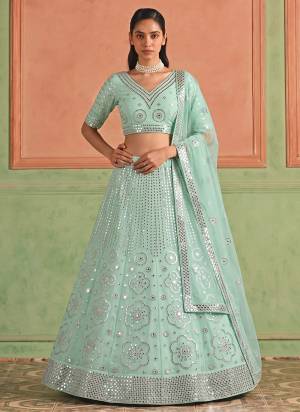 For A Designer Look,Grab These Lehenga Choli in Fine Colored.These Lehenga And Blouse Are Fabricated On Organza Pair With Soft Net Dupatta.Its Beautified With Designer Embroidery,Foil Mirror Work.