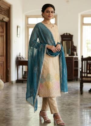 Looking These Suit in Fine Colored Pair With Bottom And Dupatta.These Top Are Salsa And Dupatta Are Fabricated On Nazmin Pair With Dul Santoon Bottom.Its Beautified With Designer Bits Embroidery Work.