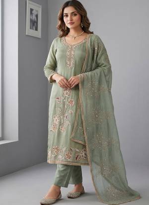 Looking These Suit in Fine Colored Pair With Bottom And Dupatta.These Top Are Salsa And Dupatta Are Fabricated On Nazmin Pair With Rayon Bottom.Its Beautified With Designer Bits Embroidery Work.