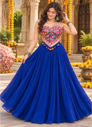 Looking These Navratri Wear Lehenga Choli in Fine Colored.These Lehenga Are Georgette Choli Are Cotton Fabricated On Crepe Inner Pair.Its Beautified With Designer Kutchi Mirror Embroidery Work.