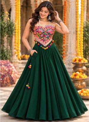 Looking These Navratri Wear Lehenga Choli in Fine Colored.These Lehenga Are Georgette Choli Are Cotton Fabricated On Crepe Inner Pair.Its Beautified With Designer Kutchi Mirror Embroidery Work.
