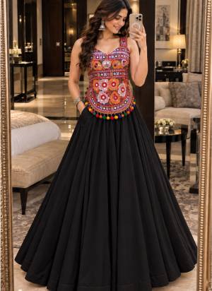 Looking These Navratri Wear Lehenga Choli in Fine Colored.These Lehenga Are Georgette Choli Are Cotton Fabricated On Crepe Inner Pair.Its Beautified With Designer Kutchi Mirror Embroidery Work.
