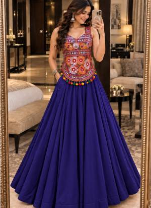 Looking These Navratri Wear Lehenga Choli in Fine Colored.These Lehenga Are Georgette Choli Are Cotton Fabricated On Crepe Inner Pair.Its Beautified With Designer Kutchi Mirror Embroidery Work.