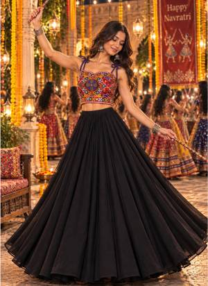 Looking These Navratri Wear Lehenga Choli in Fine Colored.These Lehenga Are Georgette Choli Are Cotton Fabricated On Crepe Inner Pair.Its Beautified With Designer Kutchi Mirror Embroidery Work.