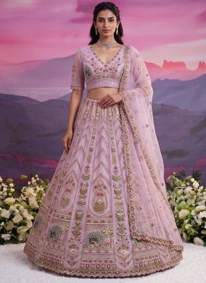 For A Fancy Designer Look,Grab These Lehenga Choli With Dupatta in Fine Colored.These Lehenga And Choli Are Net And Dupatta Are Fabricated On Soft Net Pair.Its Beautified With Thread,Jari,Sequance Embroidery,Motif Crystel Hand Work. 