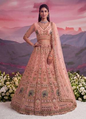 For A Fancy Designer Look,Grab These Lehenga Choli With Dupatta in Fine Colored.These Lehenga And Choli Are Net And Dupatta Are Fabricated On Soft Net Pair.Its Beautified With Thread,Jari,Sequance Embroidery,Motif Crystel Hand Work. 