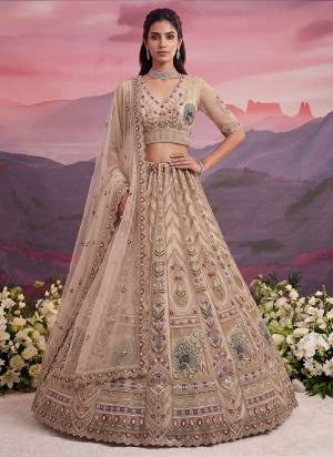For A Fancy Designer Look,Grab These Lehenga Choli With Dupatta in Fine Colored.These Lehenga And Choli Are Net And Dupatta Are Fabricated On Soft Net Pair.Its Beautified With Thread,Jari,Sequance Embroidery,Motif Crystel Hand Work. 