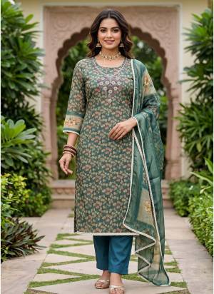 Garb These Suit in Fine Colored Pair With Bottom And Dupatta.These Top Are Lilen Simmer And Dupatta Are Fabricated On Lilen Simmer Pair With Rayon Bottom.Its Beautified With Designer Digitel Printed, Hand Work.