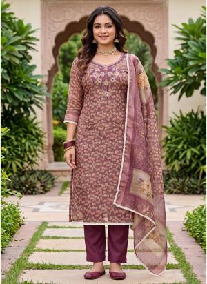 Garb These Suit in Fine Colored Pair With Bottom And Dupatta.These Top Are Lilen Simmer And Dupatta Are Fabricated On Lilen Simmer Pair With Rayon Bottom.Its Beautified With Designer Digitel Printed, Hand Work.