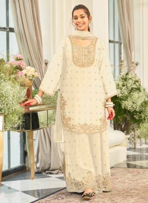 Garb These Fancy Party Wear Free Size Stitched Plazzo Suit in Fine Colored Pair.These Top And Bottom Are Chinon And Pair With Chinon Dupatta Fabric.Its Beautified With Heavy Designer Heavy Embroidery Work.