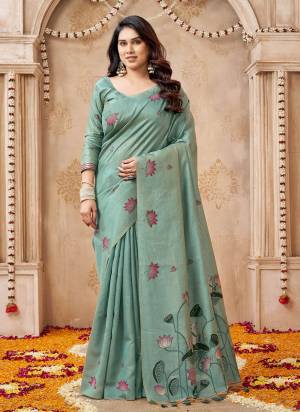 Looking These Festive And Party Wear Saree in Fine Colored.These Saree And Blouse is Fabricated On Jute Linen.Its Beautified With Weaving Pichwai Pallu And Lotus Butti Reasham Designer.