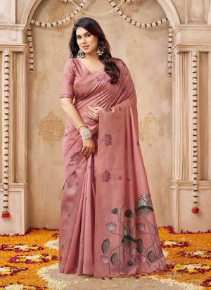 Looking These Festive And Party Wear Saree in Fine Colored.These Saree And Blouse is Fabricated On Jute Linen.Its Beautified With Weaving Pichwai Pallu And Lotus Butti Reasham Designer.