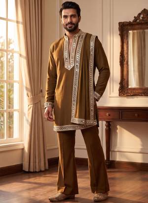Looking These Party Wear Mans Wear Kutra Pant With Dupatta wearing this fashionable. Tailored Kurta And Dupatta Are Lachaka Silk And Payjama Lachaka Silk finest Fabriced With Designer real Mirror Embroidery Work and fashioned with a banded collar for a dash of style.