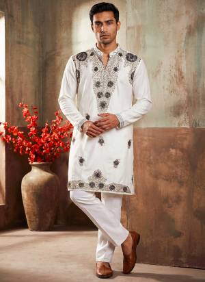 Looking These Party Wear Mans Wear Kutra Payjama in Fine Color. These Kurta Are Lachaka And Payjama Cotton Fabriced With Designer  Embroidery With Hand Work .
