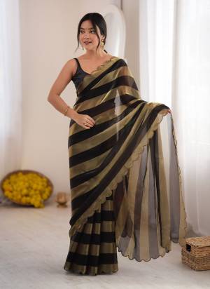 Looking These Fancy Party Wear Saree in Fine Colored.These Saree Are NC Satin And Blouse is Diamond Silk Fabricated.Its Beautified With Woven Lining Pattern Designer.