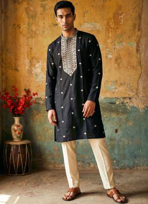 Looking These Party Wear Mans Wear Kutra Payjama in Fine Color. These Kurta Are Roman Silk And Payjama Cotton Fabriced With Designer  Embroidery Work .