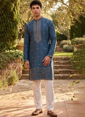 Looking These Party Wear Mans Wear Kutra Payjama in Fine Color. These Kurta Are Roman Silk And Payjama Cotton Fabriced With Designer  Embroidery Work .