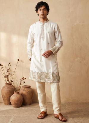 Looking These Party Wear Mans Wear Kutra Payjama in Fine Color. These Kurta Are Silk And Payjama Cotton Fabriced With Designer  Embroidery Work .