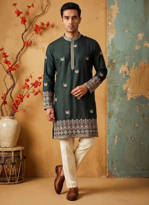 Looking These Party Wear Mans Wear Kutra Payjama in Fine Color. These Kurta Are Silk And Payjama Cotton Fabriced With Designer  Embroidery Work .