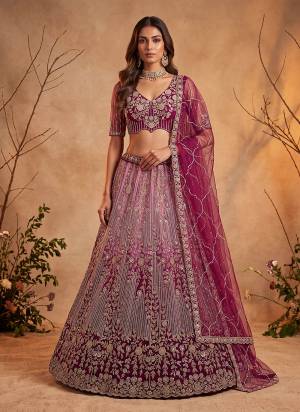 For A Fancy Designer Look,Grab These Lehenga Choli With Dupatta in Fine Colored.These Lehenga And Choli Are Net And Dupatta Are Fabricated On Soft Soft Pair.Its Beautified With Jari,Sequance,Multy Thread Embroidery,Crystel Hand Work. 