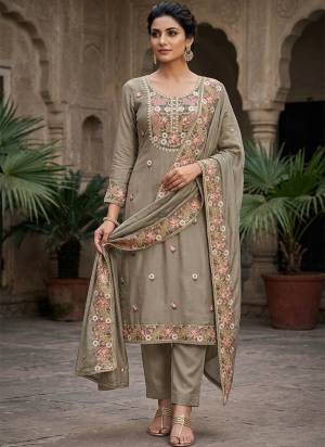Looking These Suit in Fine Colored Pair With Bottom And Dupatta.These Top Are PV Cotton And Dupatta Are Fabricated On Nazmin Pair With Dul Santoon Bottom.Its Beautified With Designer Embroidery Work.
