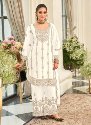 Attractive These Party Wear Designer Plazzo Suit in Fine Colored Pair With Bottom And Dupatta.These Top Are Chinon And Dupatta Are Fabricated On Chinon Pair With Chinon Bottom.Its Beautified With Crepe Silk Inner.Its Beautified With Heavy Designer Embroidery Work.