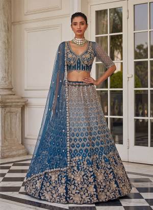 For A Fancy Designer Look,Grab These Lehenga Choli With Dupatta in Fine Colored.These Lehenga And Choli Are Net And Dupatta Are Fabricated On Soft Soft Pair.Its Beautified With Jari,Sequance,Multy Thread Embroidery,Crystel Hand Work. 