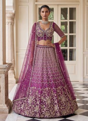 For A Fancy Designer Look,Grab These Lehenga Choli With Dupatta in Fine Colored.These Lehenga And Choli Are Net And Dupatta Are Fabricated On Soft Soft Pair.Its Beautified With Jari,Sequance,Multy Thread Embroidery,Crystel Hand Work. 