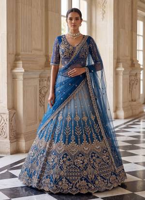 For A Fancy Designer Look,Grab These Lehenga Choli With Dupatta in Fine Colored.These Lehenga And Choli Are Net And Dupatta Are Fabricated On Soft Soft Pair.Its Beautified With Jari,Sequance,Multy Thread Embroidery,Crystel Hand Work. 