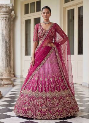 For A Fancy Designer Look,Grab These Lehenga Choli With Dupatta in Fine Colored.These Lehenga And Choli Are Net And Dupatta Are Fabricated On Soft Soft Pair.Its Beautified With Jari,Sequance,Multy Thread Embroidery,Crystel Hand Work. 