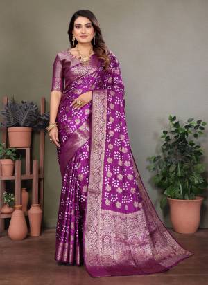 Attractive These Festive And Party Wear Saree in Fine Colored.These Saree And Blouse is Fabricated On Satin Silk.Its Beautified With Weaving Jari Rich Pallu Border And Butta Designer With Hand Made Bandhej Saree.