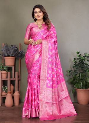 Attractive These Festive And Party Wear Saree in Fine Colored.These Saree And Blouse is Fabricated On Satin Silk.Its Beautified With Weaving Jari Rich Pallu Border And Butta Designer With Hand Made Bandhej Saree.