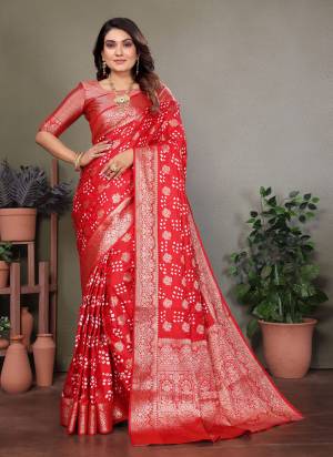 Attractive These Festive And Party Wear Saree in Fine Colored.These Saree And Blouse is Fabricated On Satin Silk.Its Beautified With Weaving Jari Rich Pallu Border And Butta Designer With Hand Made Bandhej Saree.